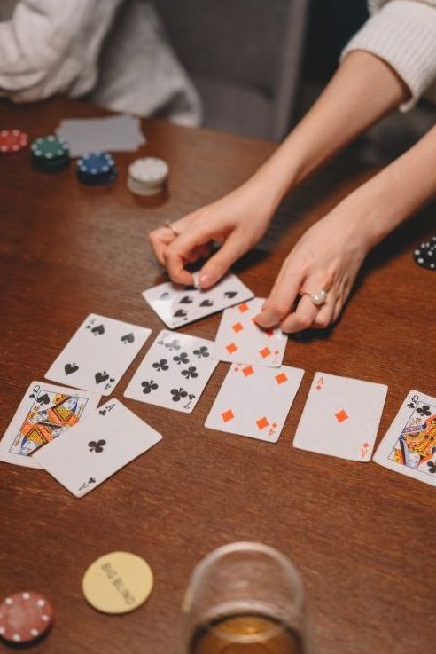 Playing cards and chips laid out across the table
